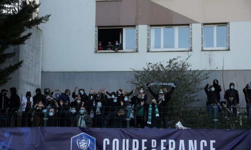 Seeing Red: Even though the match was played behind closed doors, Red Star fans found ways to cheer their tea to a cup victory over Lens
