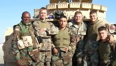 George Okoth with US army soldiers