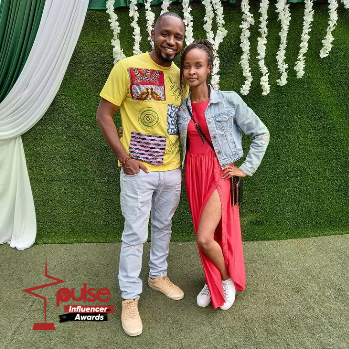 Activist Boniface Mwangi with a guest at the Pulse Influencer Awards ceremony in Nairobi