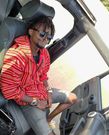 Kenyan musician Ayrosh in a classy hoodie-jeans look