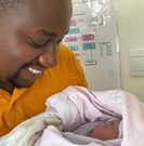 Kennedy Murithi with his daughter