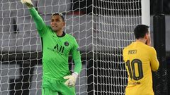 A Keylor Navas save from Lionel Messi's penalty helped secure Paris Saint-Germain's qualification for the Champions League quarter-finals at Barcelona's expense