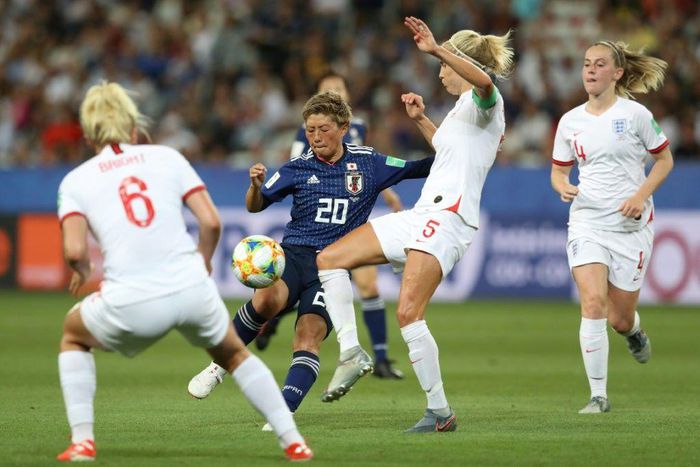 Japanese Women's World Cup star Kumi Yokoyama (2L) has come out as a transgender man