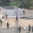 A gunman outside the French Embassy in Dar es Salaam