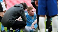 De Bruyne down: Kevin De Bruyne (centre)had to be replaced with an ankle injury during Manchester City's FA Cup semi-final against Chelsea