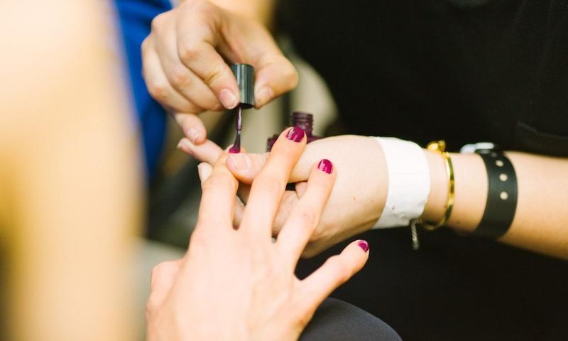 19. Having a manicure.