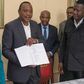President Uhuru Kenyatta with his legal team including Evans Monari (back right)