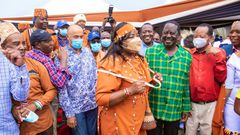 Mama Ida Odinga adorned in the Kikuyu traditional attire for women, christened "Nyawira" during Raila Odinga's Nyeri tour