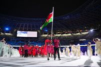 TOKYO, JAPAN - JULY 23: Flag bearers Mercy Moim and Andrew Amonde of Team Kenya during the Opening Ceremony of the Tokyo 2020 Olympic Games at Olympic Stadium on July 23, 2021 in Tokyo, Japan. (Photo by Matthias Hangst/Getty Images)