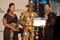 DRC Commercial attaché and OGEFREM representative in Kenya Ms. Berthe Morisho (right) leads her team in receiving certificate for 1st Runner Up under Private Sector Business Membership category at the EAMA 2020 Awards