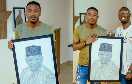 Alikiba in tears as fan surprises him with a portrait of his late Father (Video)