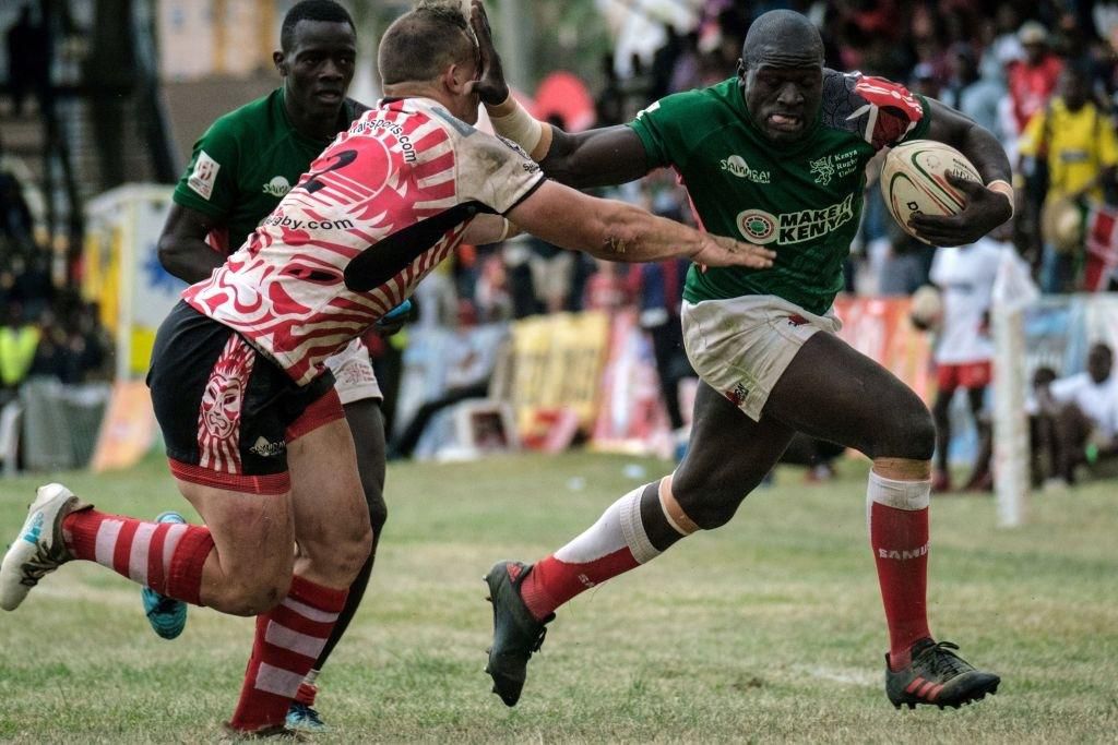 {FILE PHOTO} Alvin Otieno Ochieng (R) of Kenya's national team Shujaa blocks Ruan Mostert of Samurai RFC during the final of Safari Sevens, Kenya's annual rugby sevens tournament with professional and amature teams, in Nairobi, Kenya, on November 11, 2018. (Photo by Yasuyoshi CHIBA / AFP) (Photo credit should read YASUYOSHI CHIBA/AFP via Getty Images)