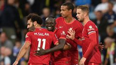 Liverpool's Sadio Mane (C) celebrates with Mohamed Salah (L)