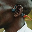 Eliud Kipchoge wearing his favourite brand of earphones