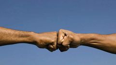 A fist bump is the way to go as scientists say it can protect yourself against various infections including the coronavirus (heavy)