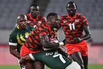 Kenya's Nelson Oyoo (L) is tackled by South Africa's Branco du Preez in the men's pool C rugby sevens match between South Africa and Kenya during the Tokyo 2020 Olympic Games at the Tokyo Stadium in Tokyo on July 26, 2021. (Photo by Ben STANSALL / AFP) (Photo by BEN STANSALL/AFP via Getty Images)