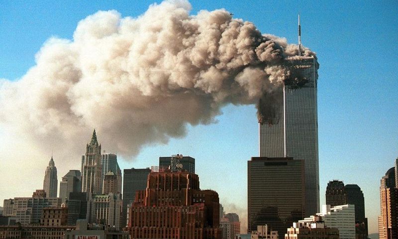 NEW YORK - SEPTEMBER 11, 2001: (SEPTEMBER 11 RETROSPECTIVE) Smoke pours from the twin towers of the World Trade Center after they were hit by two hijacked airliners in a terrorist attack September 11, 2001 in New York City. (Photo by Robert Giroux/Gett...