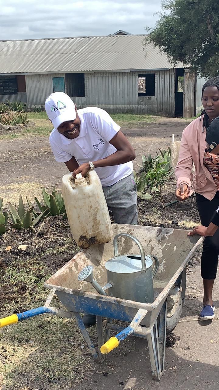 Davidson Wakairu Gatuhi during a tree-planting exercise at Mavoko Primary School, Kilifi County