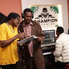 Singer B-Classic gifts Omosh, a camera, Tripod and Microphone