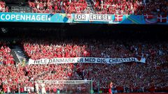 Danish supporters take part in a moment of applause for Christian Eriksen during the Euro 2020 game against Belgium