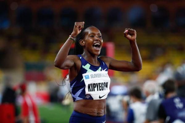 First-placed Kenya's Faith Kipyegon celebrates as she crosses the finish line in the Women's 1500m during the IAAF Diamond League competition on July 9, 2021 in Monaco.