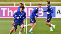 England defender Harry Maguire (left) is fit to return against Scotland