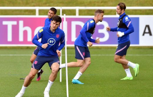 England defender Harry Maguire (left) is fit to return against Scotland