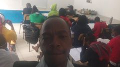 Purity Museo's stalker takes selfie with his students