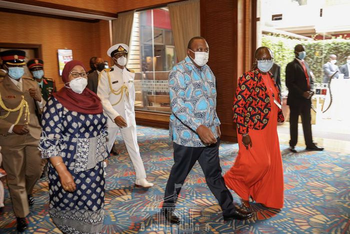 President Uhuru Kenyatta with Tanzanian President Samia Suluhu and Trade CS Betty Maina