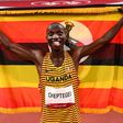 TOKYO, JAPAN - AUGUST 06: Joshua Cheptegei of Team Uganda celebrates after winning gold in the Men's 5000m Final on day fourteen of the Tokyo 2020 Olympic Games at Olympic Stadium on August 6, 2021 in Tokyo, Japan. (Photo by Dylan Martinez - Pool / Get...