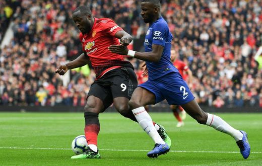 Antonio Rudiger (right) could soon be teaming up with Belgian striker Romelu Lukaku (left)at Chelsea
