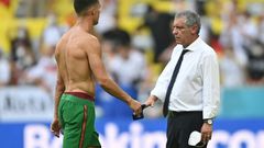 Portugal coach Fernando Santos consoles Cristiano Ronaldo after the defeat in Munich