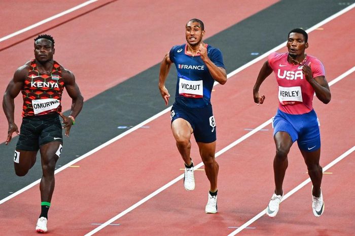 (L-R) Ferdinand OMURWA of Kenya, Jimmy VICAUT of France and Fred KERLEY of USA (100m) during athletics day three at Olympic Stadium on August 1, 2021 in Tokyo, Japan. (Photo by Anthony Dibon/Icon Sport via Getty Images)