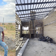 Activist Boniface Mwangi at the construction site of his Machakos family home. The house was invaded on the night of October 20, 2021