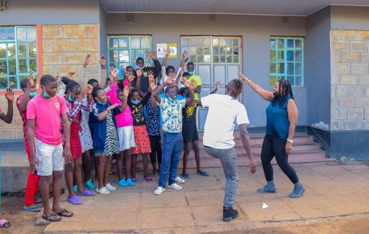 Guardian Angel visits Mathare Children Home, with  Malawian singer Wendy Favour Harawa