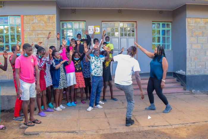 Guardian Angel visits Mathare Children Home, with  Malawian singer Wendy Favour Harawa