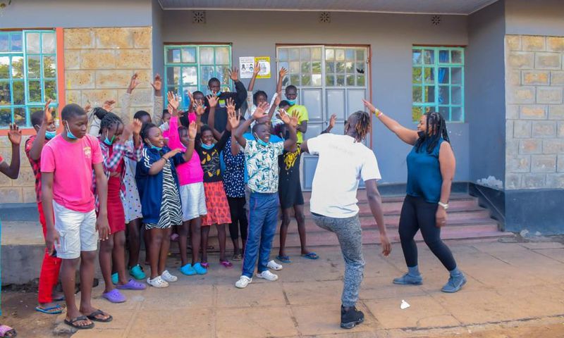 Guardian Angel visits Mathare Children Home, with  Malawian singer Wendy Favour Harawa