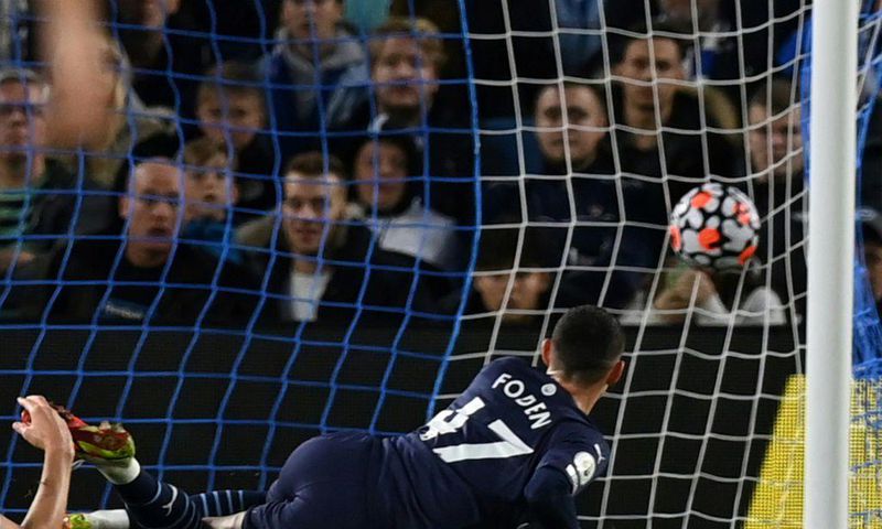 Phil Foden scored twice as Manchester City eased past Brighton