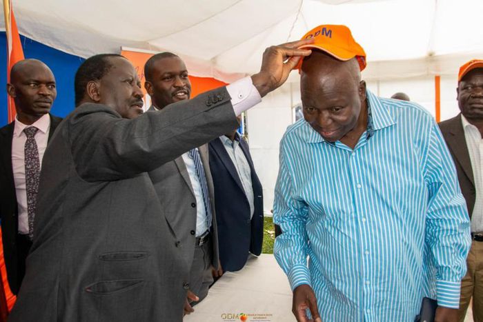 Jakoyo Midiwo and Raila Odinga