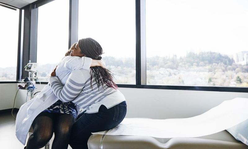 Two women hugging