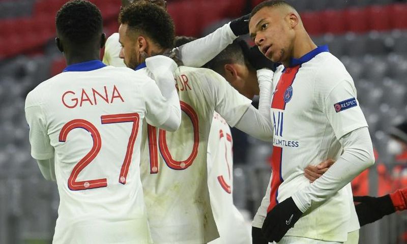 Kylian Mbappe (R) celebrates with his Paris Saint-Germain team-mates after scoring his second goal against Bayern Munich on Wednesday