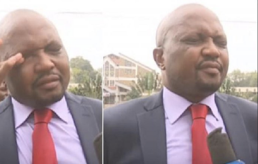 Gatundu South MP Moses Kuria wiping teargas from his face
