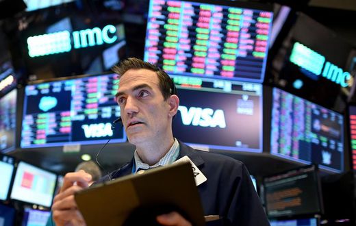 Traders at work at the New York Stock Exchange.