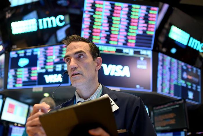 Traders at work at the New York Stock Exchange.