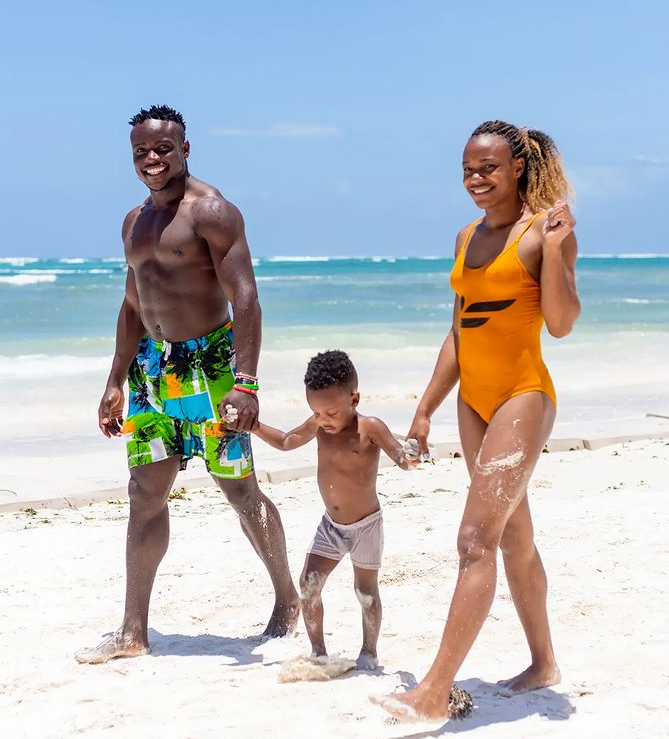 Kenyan athlete Ferdinand Omanyala vacations with his wife and son at the Coast