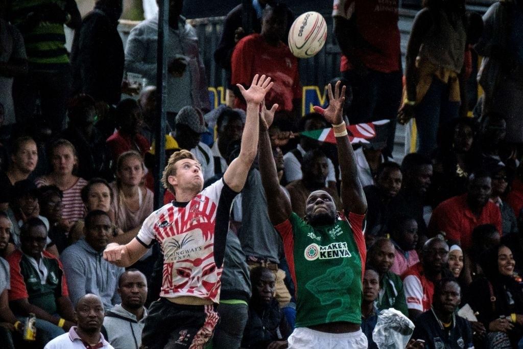 Oscar Dennis (L) of Samurai RFC, and Humwa Herman Francis of Kenya's national team Shujaa jump for the ball during the final of Safari Sevens, Kenya's annual rugby sevens tournament with professional and amature teams, in Nairobi, Kenya, on November 11, 2018. (Photo by Yasuyoshi CHIBA / AFP) (Photo credit should read YASUYOSHI CHIBA/AFP via Getty Images)