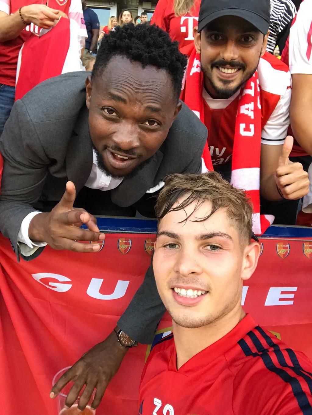 David the Student pictured with Arsenal midfielder Emile Smith Rowe