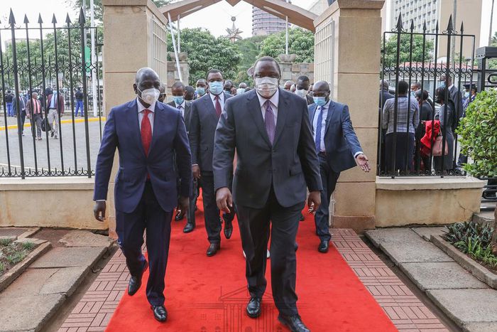 President Uhuru Kenyatta with his deputy William Ruto during the 2021 National Prayer Breakfast at Parliament buildings