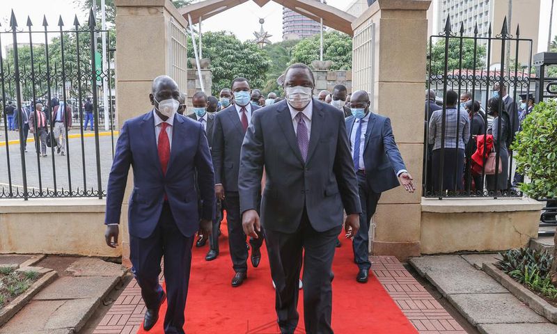 President Uhuru Kenyatta with his deputy William Ruto during the 2021 National Prayer Breakfast at Parliament buildings