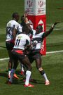 [FILE] HAMILTON, NEW ZEALAND - JANUARY 26: Collins Injera of Kenya celebrates with Alvin Otieno after scoring a try during the match between South Africa v Kenya at the 2020 HSBC Sevens at FMG Stadium Waikato on January 26, 2020 in Hamilton, New Zealand. (Photo by Hagen Hopkins/Getty Images)
